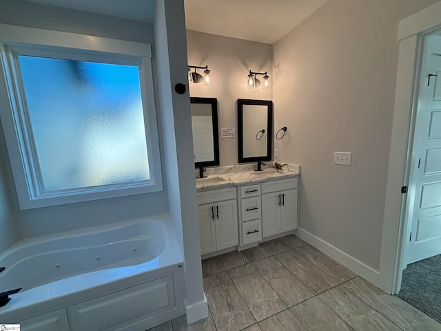 bathroom featuring vanity and a bathtub