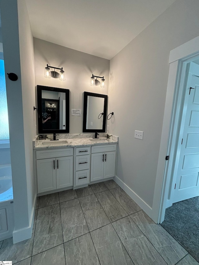 bathroom featuring vanity and a bathtub