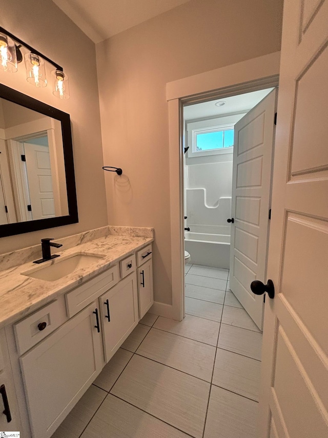 full bathroom featuring vanity, toilet, independent shower and bath, and tile patterned flooring