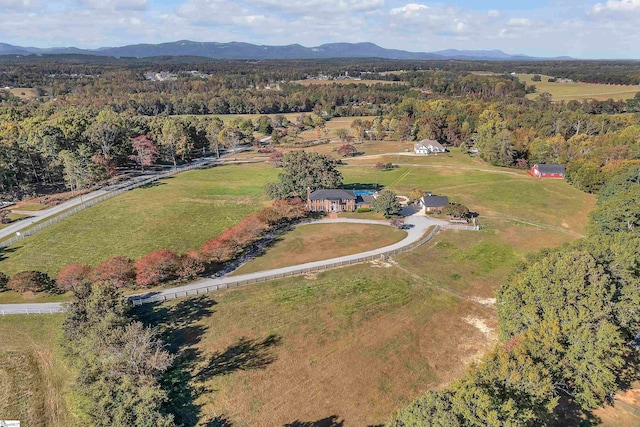 bird's eye view featuring a mountain view and a rural view