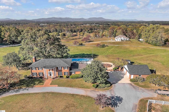 drone / aerial view featuring a mountain view