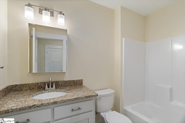 full bathroom featuring vanity, toilet, and shower / tub combination