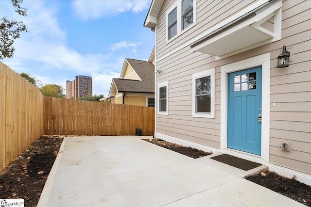 doorway to property featuring a patio area