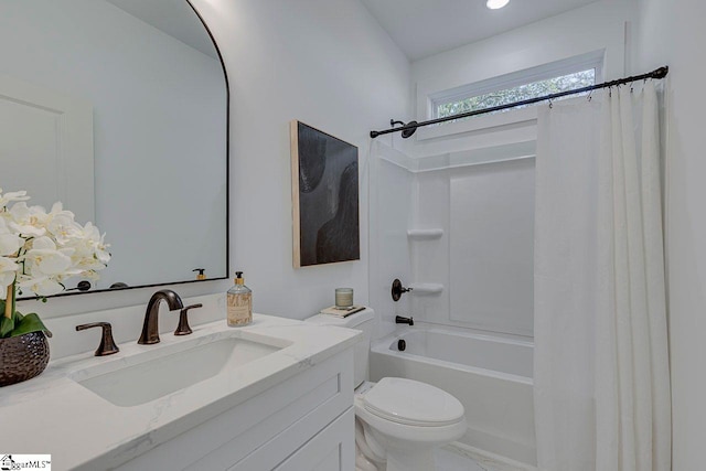 full bathroom featuring toilet, vanity, and shower / bath combination with curtain