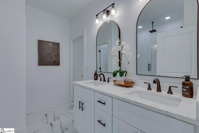 bathroom featuring vanity and an enclosed shower