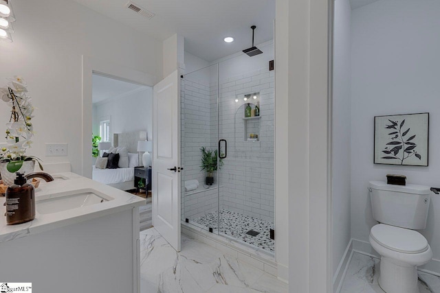 bathroom featuring vanity, toilet, and walk in shower