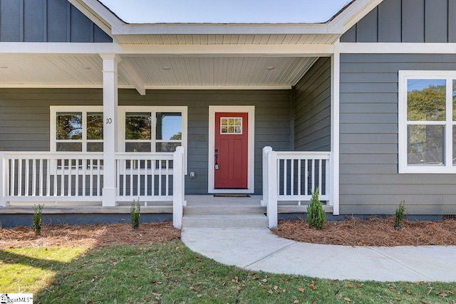 entrance to property with a porch