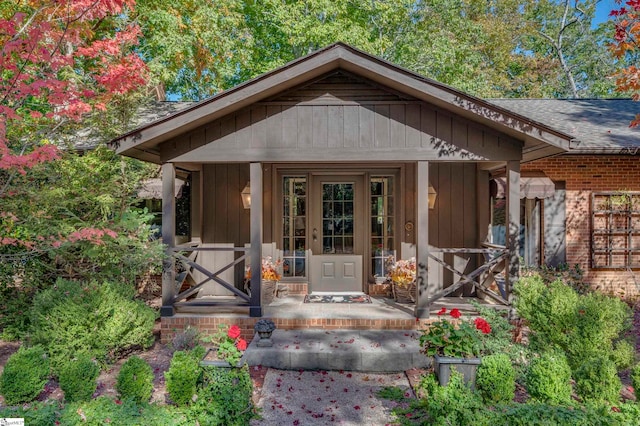 property entrance with covered porch