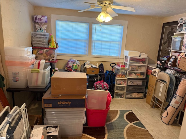 storage area featuring ceiling fan