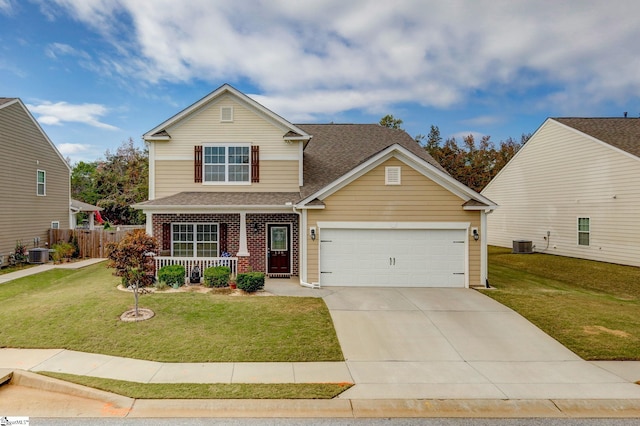 view of front of house with central AC, a front lawn, and a porch