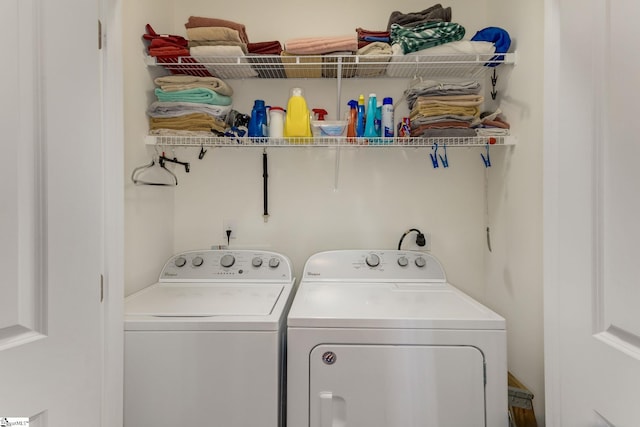 laundry area with separate washer and dryer