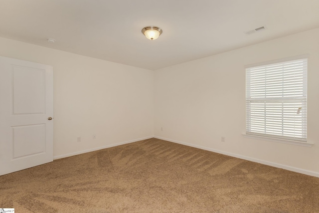 view of carpeted spare room