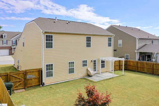 back of property featuring a patio area and a lawn