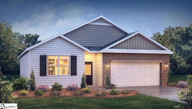 view of front of property featuring a front lawn and a garage