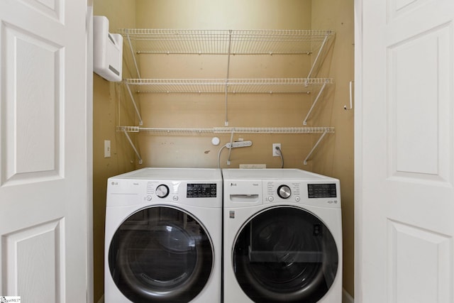 washroom featuring separate washer and dryer