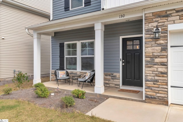 property entrance with a porch