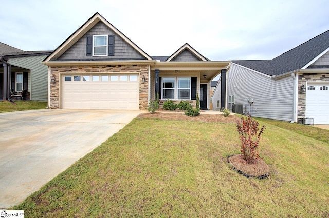 craftsman-style home featuring a front lawn and central AC unit