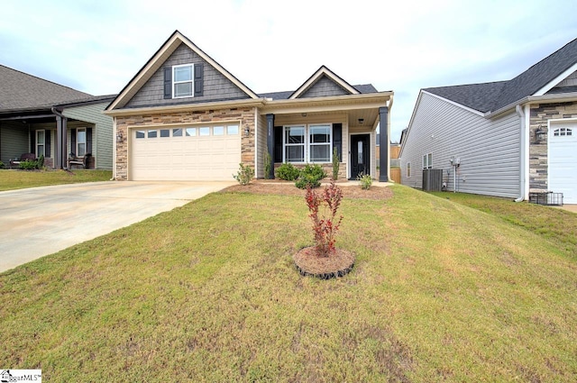 craftsman-style home with central AC and a front lawn