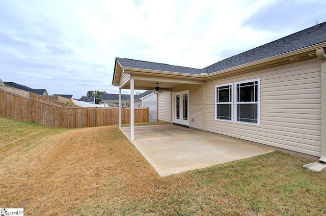 view of yard with a patio and ceiling fan