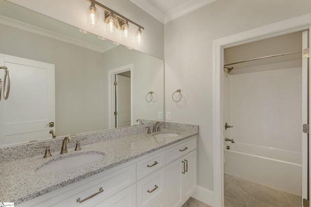 full bath with ornamental molding, a sink, shower / bathing tub combination, and double vanity