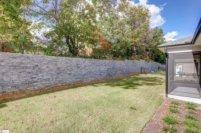 view of yard featuring a fenced backyard