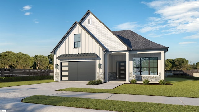 view of front of house featuring a garage and a front yard