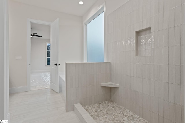 bathroom featuring tile patterned flooring, a healthy amount of sunlight, ceiling fan, and independent shower and bath