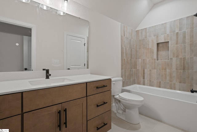 full bathroom with vanity, tiled shower / bath combo, tile patterned flooring, toilet, and lofted ceiling