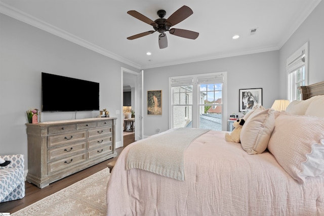 bedroom featuring ceiling fan, access to exterior, dark hardwood / wood-style flooring, and ornamental molding