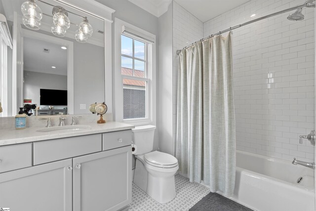 full bathroom featuring toilet, vanity, tile patterned flooring, and shower / bath combo with shower curtain