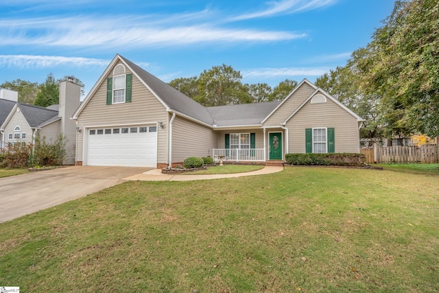 view of front of home with a porch, a front yard, and a garage