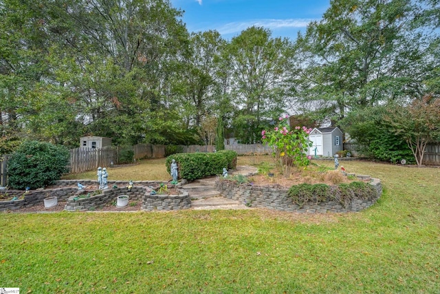 view of yard with a storage unit