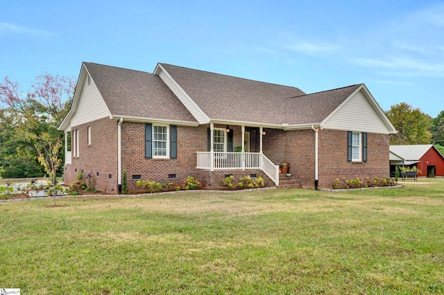 view of front facade with covered porch and a front lawn