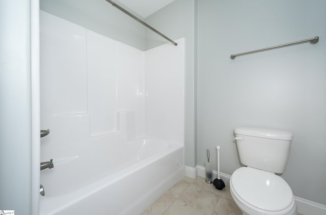 bathroom featuring  shower combination and toilet