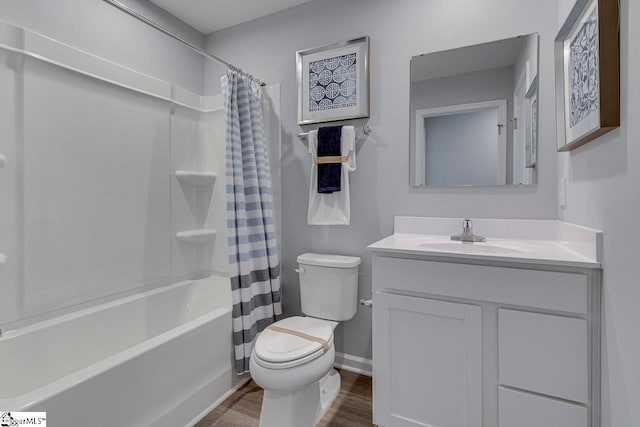 full bathroom featuring shower / tub combo with curtain, vanity, hardwood / wood-style flooring, and toilet