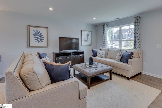 living room with hardwood / wood-style flooring