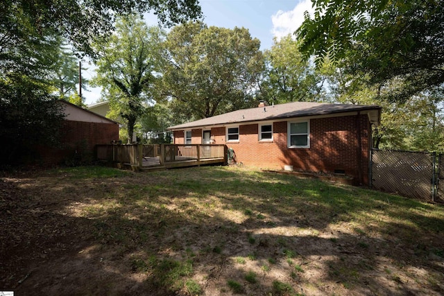 view of yard featuring a deck