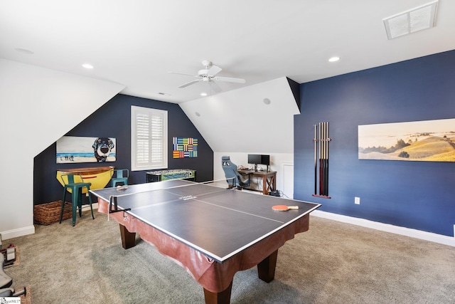 recreation room featuring ceiling fan, carpet flooring, and vaulted ceiling