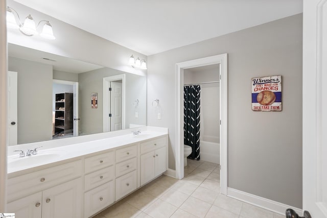 full bathroom featuring toilet, shower / bathtub combination with curtain, vanity, and tile patterned floors