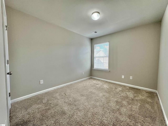 empty room featuring carpet