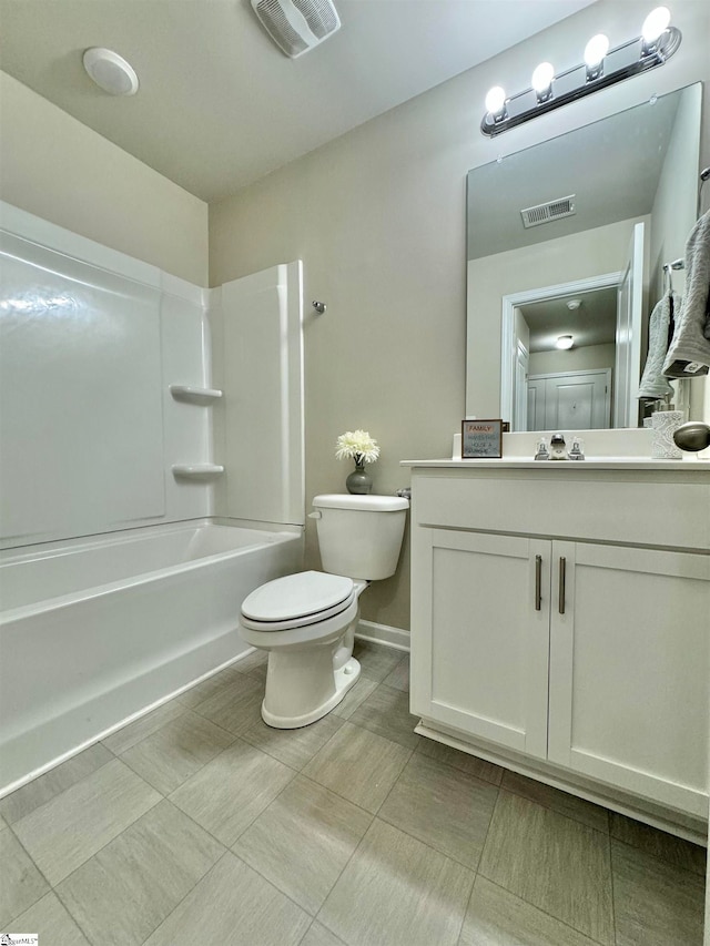 full bathroom with vanity, washtub / shower combination, and toilet