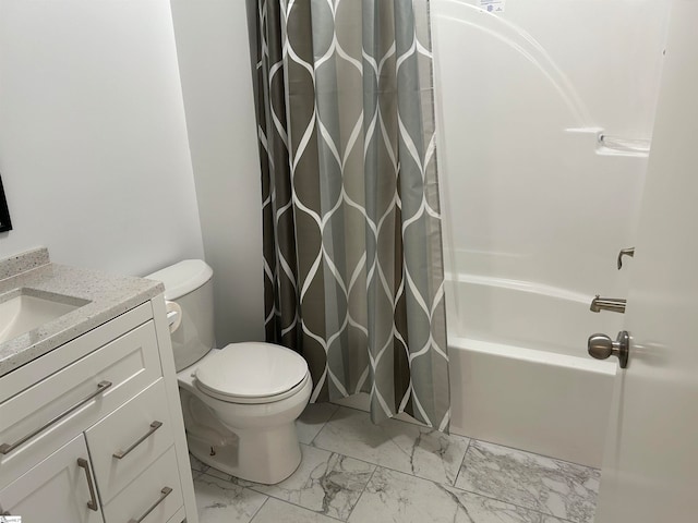 full bathroom with vanity, shower / tub combo, and toilet