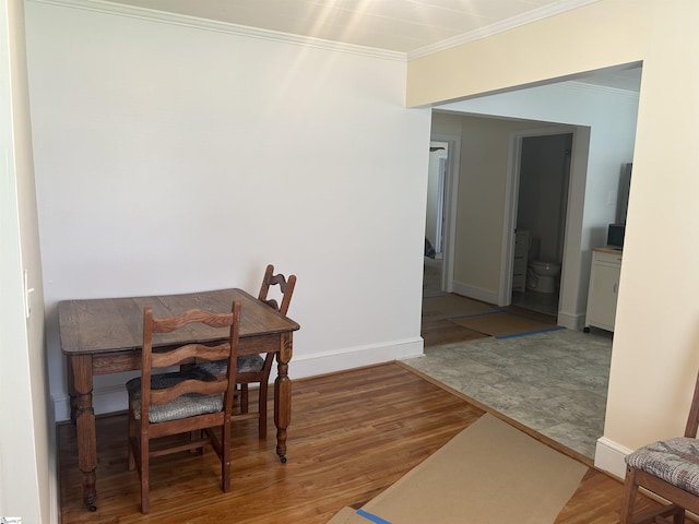 611 Shands St, Clinton, SC 29325 - dining area with ornamental molding and wood finished floors