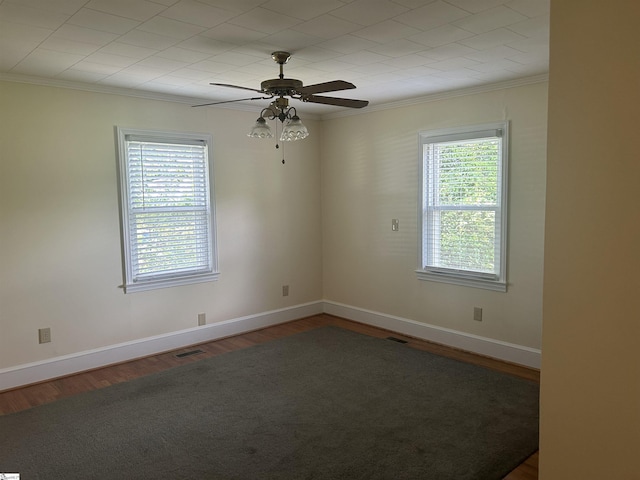 611 Shands St, Clinton, SC 29325 - spare room with crown molding, wood finished floors, and ceiling fan
