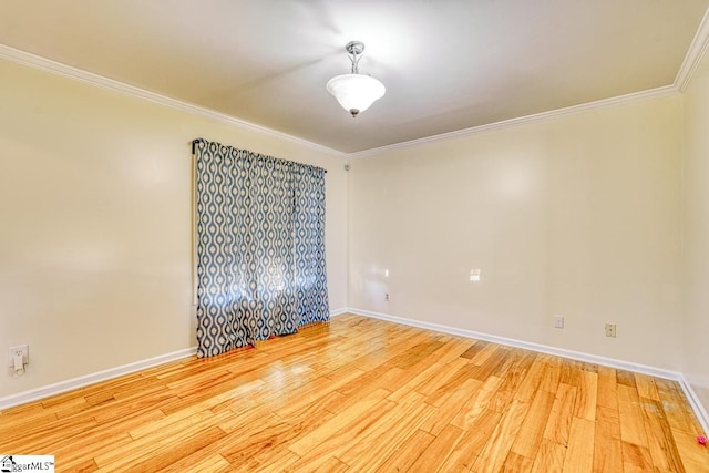 unfurnished room with light hardwood / wood-style floors and ornamental molding