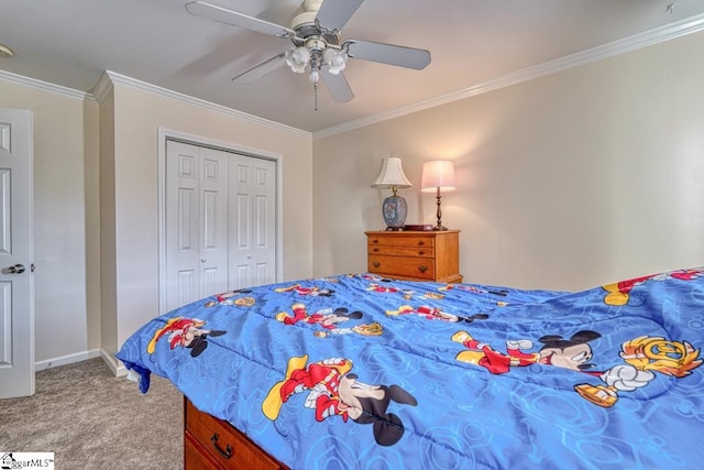 carpeted bedroom featuring a closet, crown molding, and ceiling fan