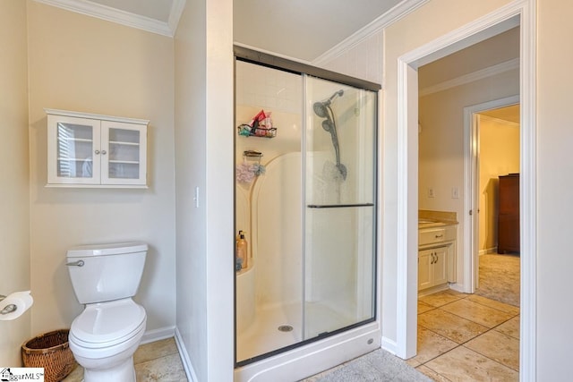 bathroom featuring a shower with door, toilet, tile patterned floors, vanity, and crown molding