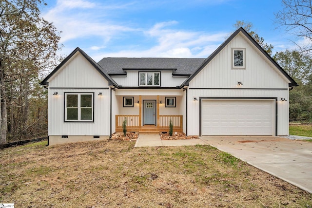 modern inspired farmhouse with a garage, a shingled roof, crawl space, a porch, and driveway