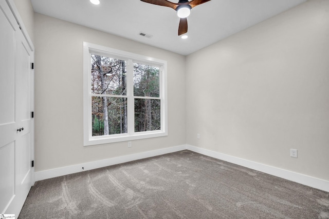 interior space with ceiling fan, visible vents, baseboards, carpet flooring, and recessed lighting