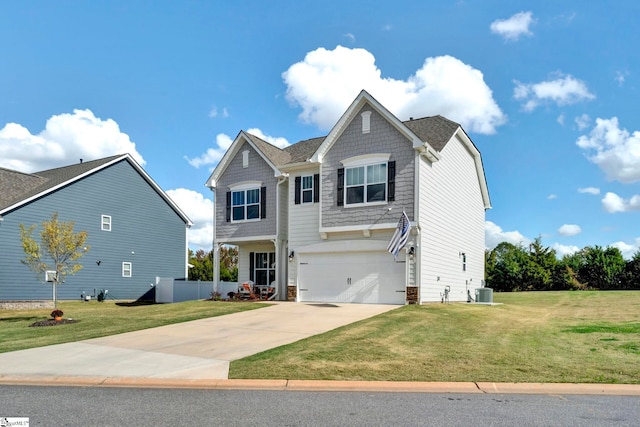 view of front of property with a front yard, a garage, and cooling unit